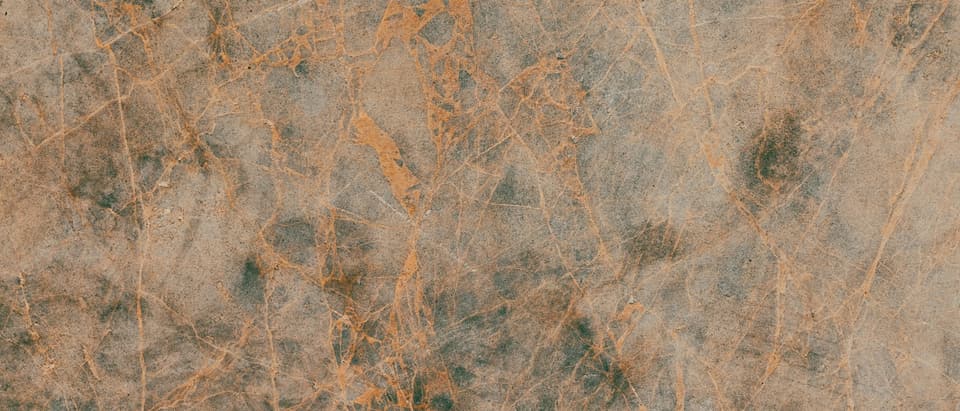 a close up of a brown marble surface