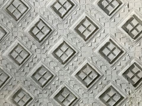 3D CNC Carved Panels: a close up of a wall with a pattern on it