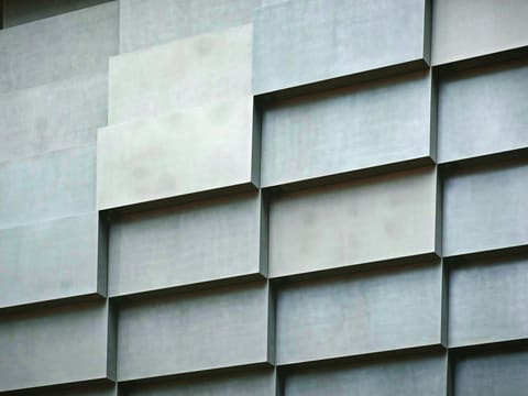 Acoustic Fabric Panels: white concrete building during daytime