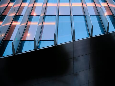 Aluminium Curtain Wall: a close up of a building with many windows