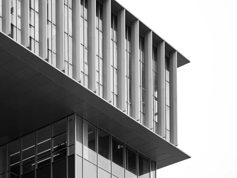 Aluminium Window Systems: a black and white photo of a tall building