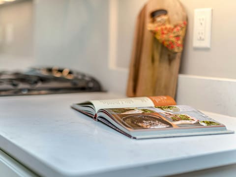 Engineered Quartz: white book on blue table