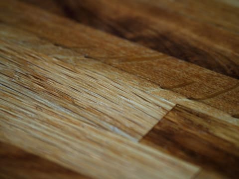 a close up of a wooden cutting board