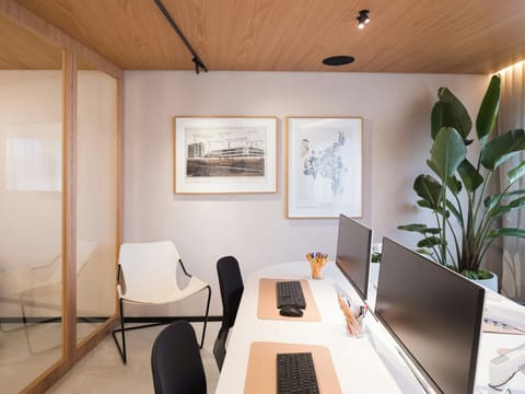 Office Desks & Task Chairs: modern office with computers and plants