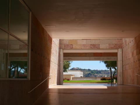 Aluminium & Glass Pivot Doors: a room with a large window