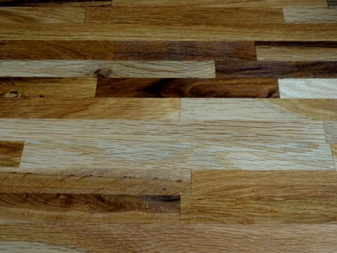 Solid Hardwood: brown and beige wooden floor