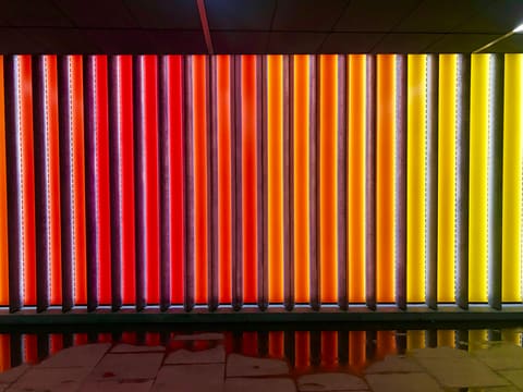 Translucent Resin & Acrylic Panels: red and yellow led wall