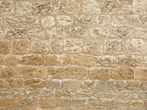 Travertine: brown brick wall