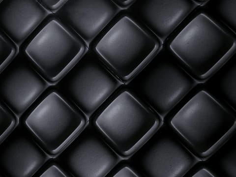 Upholstery Fabrics: dark textured background with repeating diamond shapes