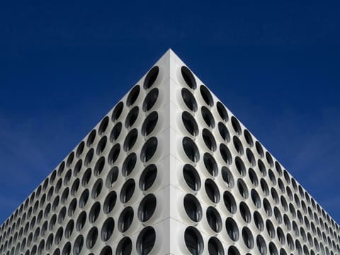Ventilated Facade Systems: white concrete building under blue sky during daytime