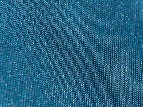 Wallpaper & Wall Fabrics: a close up of a blue fabric texture