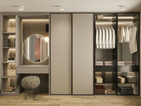 Wardrobes & Walk-In Closets: a walk in closet with a mirror and a stool