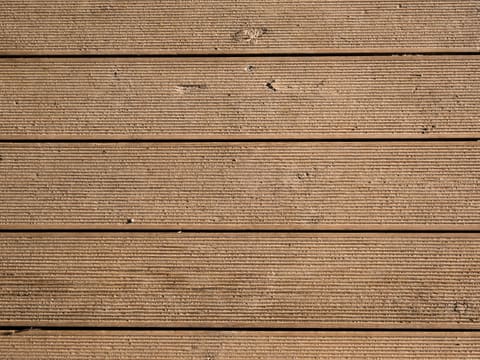 WPC Decking & Cladding: brown and black wooden wall